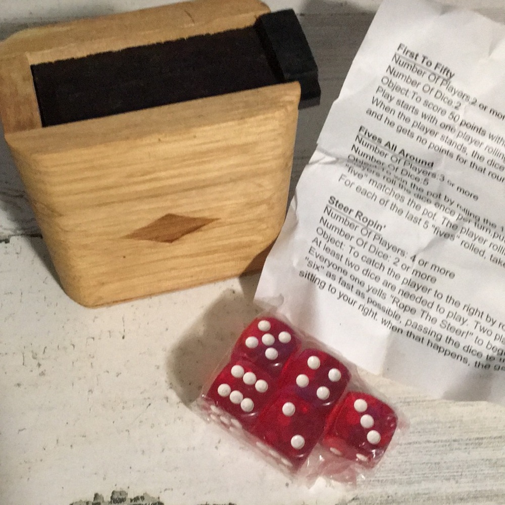 Small wooden box with “Big Stakes” dice and instructions for different games